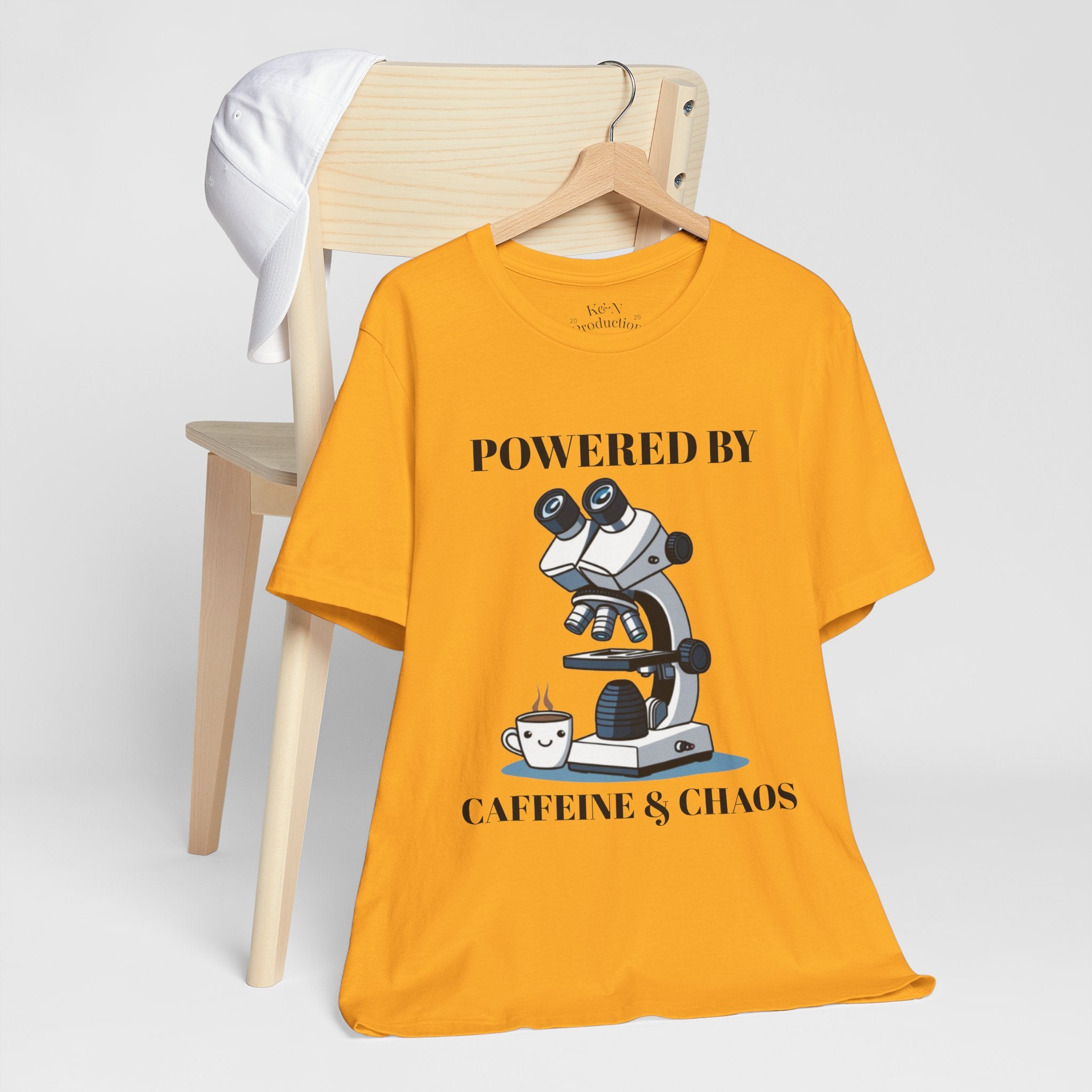 “Powered by Caffeine & Chaos” Funny Lab Tech T-Shirt – Cartoon Microscope & Coffee Cup