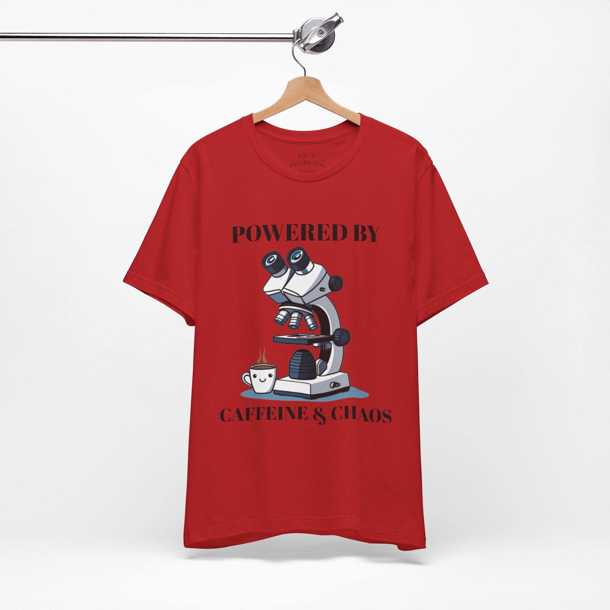 “Powered by Caffeine & Chaos” Funny Lab Tech T-Shirt – Cartoon Microscope & Coffee Cup