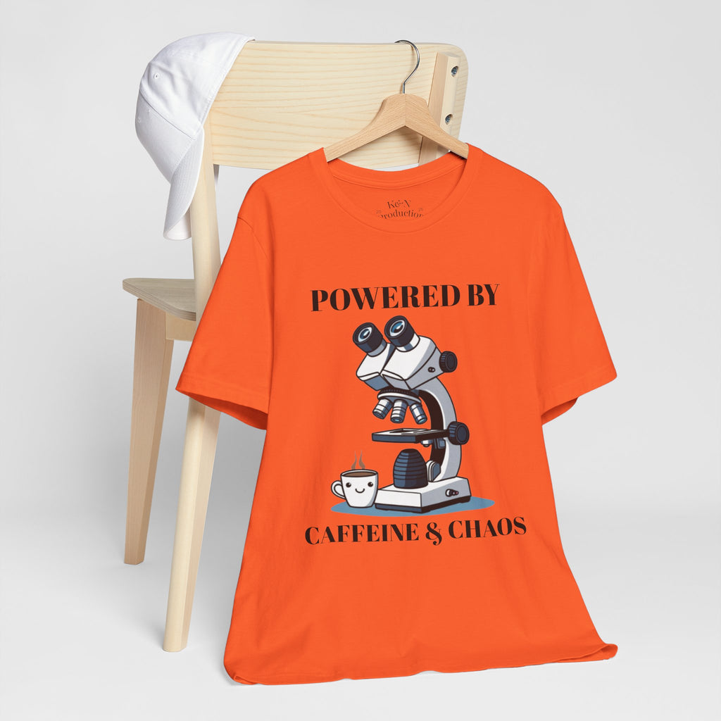 “Powered by Caffeine & Chaos” Funny Lab Tech T-Shirt – Cartoon Microscope & Coffee Cup